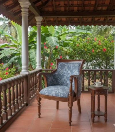 Rajadhani Depo Teak Cushion Sitout Chair crafted in solid teak for relaxed outdoor lounging