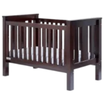 Compact teak crib for baby bedroom and nursery use